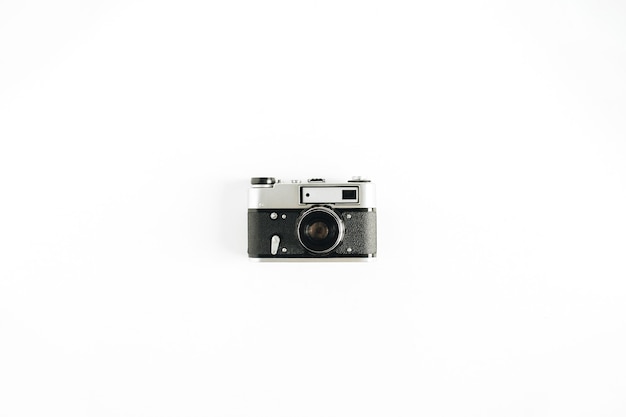 Retro photo camera minimalistic hipster flat lay concept