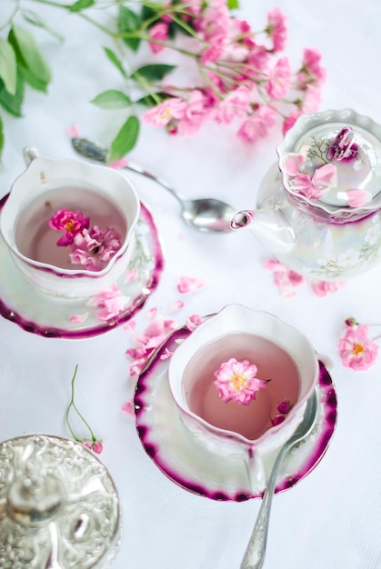 retro porcelain cup of hot rose tea