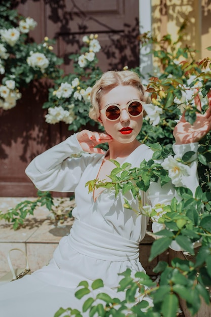 retro and vintage woman in the middle of flowers