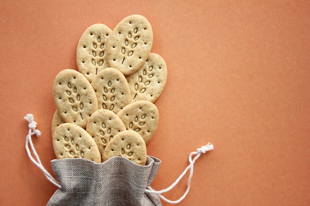 Reusable canvas bag and multigrain biscuits. 