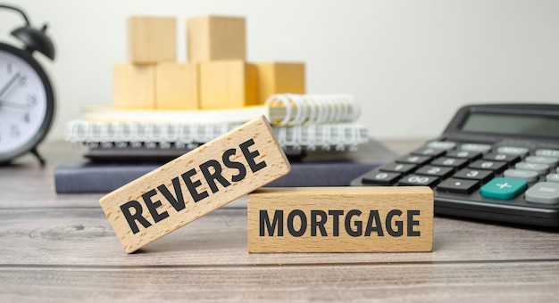 REVERSE MORTGAGE on the work table and alarm clock