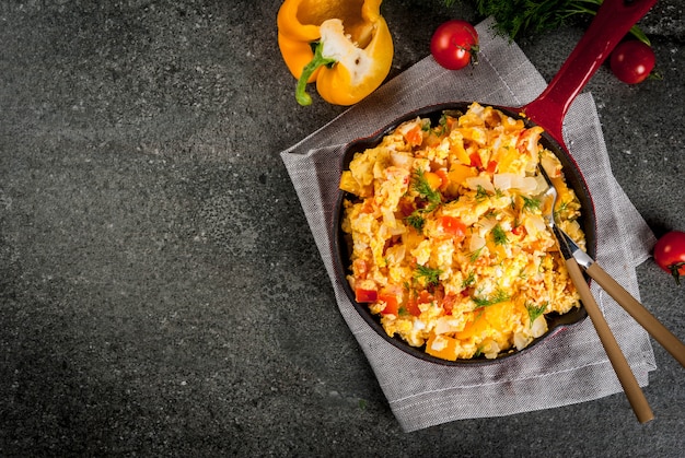 Revoltillo de Huevos Scrambled Eggs a la Dominicana in portioned skillet