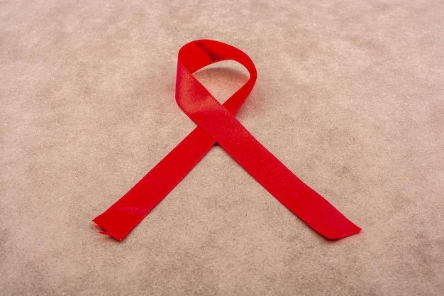 Ribbon of red color on plain background