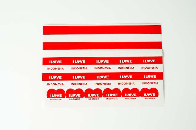 Photo ribbon red and white flag of indonesia independence day august 17th stiker i love indonesia isolated