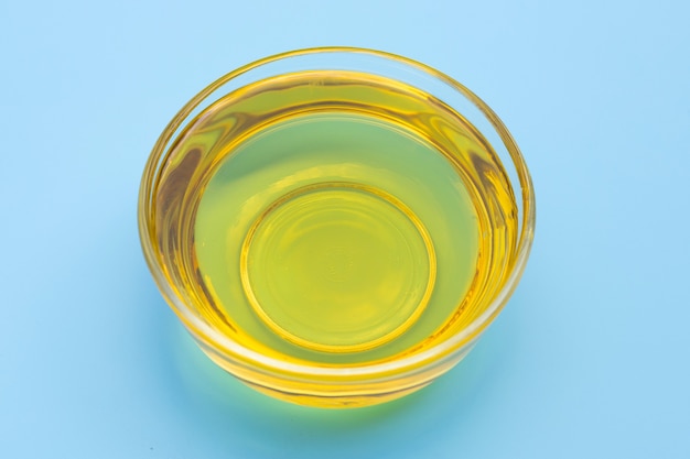 Rice bran oil on blue background.