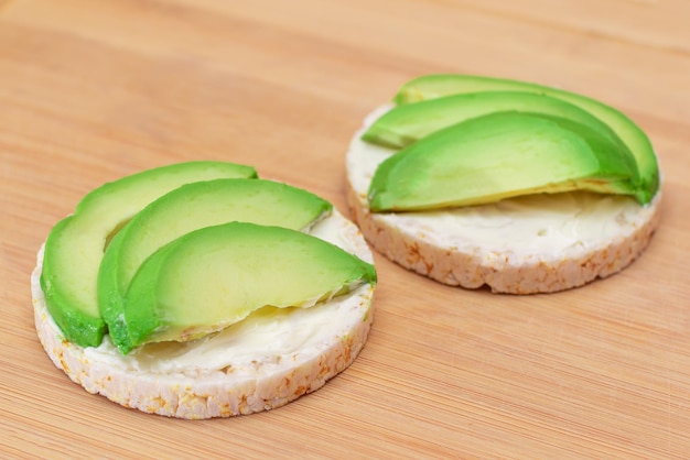 Rice cake sandwiches with fresh avocado and cream cheese