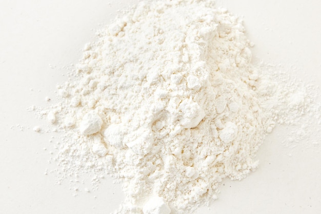 Rice flour close up background A pile of Rice flour on a white background