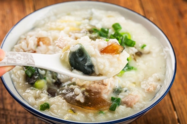 Rice preserved egg lean meat porridgechinese rice porridge chinese traditional healthy breakfast