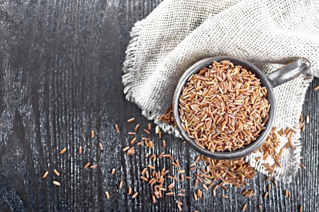 Rice red in cup on board top