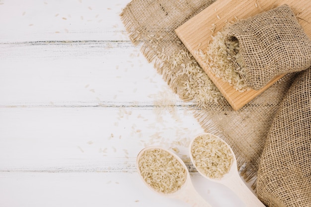 Rice in spoons and bag