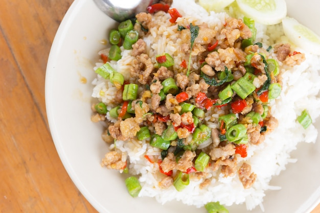 Rice topped with stir-fried pork and basil