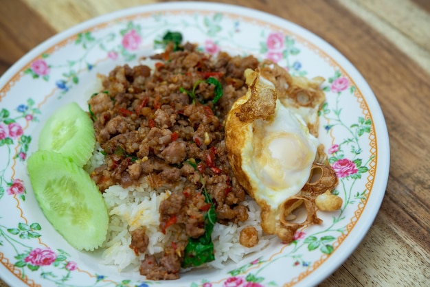 Rice topped with stirfried pork or beef and basil