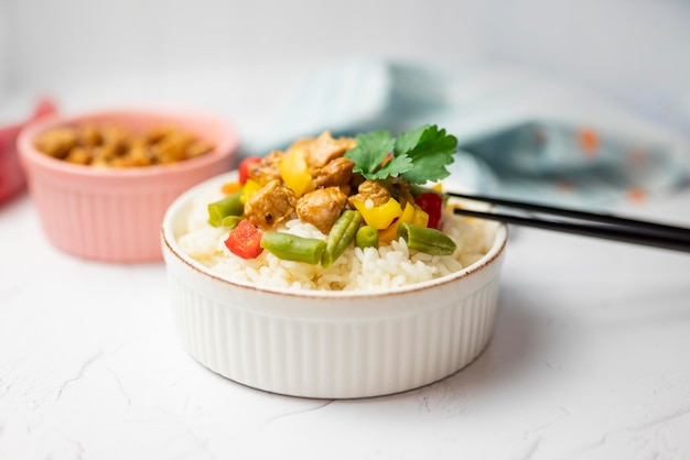 rice with vegetables and meat kung pao asian dish side dish with pork or beef on a plate