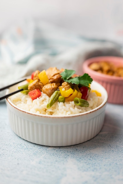 rice with vegetables and meat kung pao asian dish side dish with pork or beef on a plate