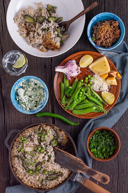 Rice with vegetables.  process of preparing a vegetarian meal