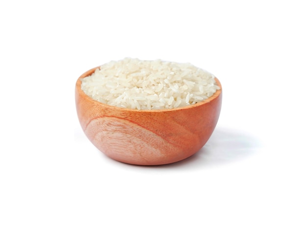 Rice with wooden bowl isolated on a white background