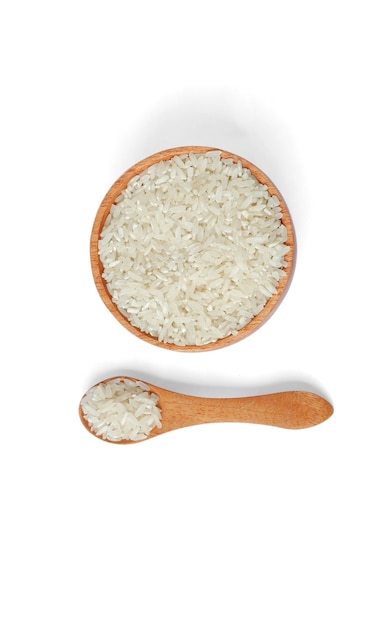 Rice with wooden bowl and wooden spoon isolated on white background,Top view