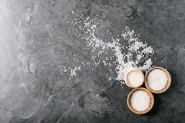 Rice in wooden and ceramic bowls