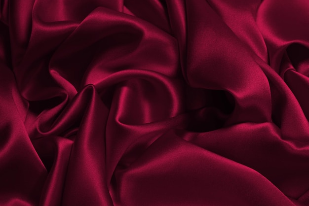 Rich and luxury viva magenta silk fabric texture background