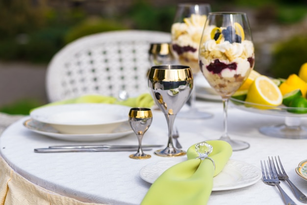 Richly decorated Banquet table with napkins with diamond ring at the Banquet