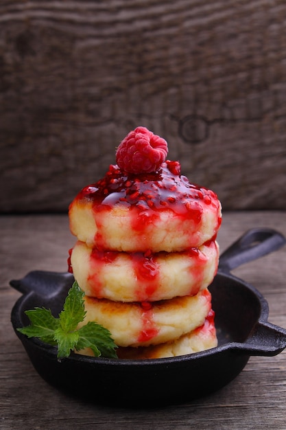 Ricotta pancakes Syrniki Cottage cheese pancakes Fritters of cottage cheese traditional Ukrainian and Russian cuisine