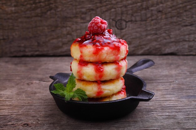 Ricotta pancakes Syrniki Cottage cheese pancakes Fritters of cottage cheese traditional Ukrainian and Russian cuisine