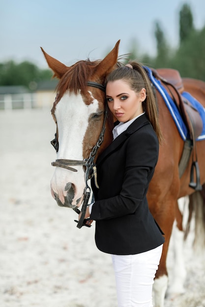 Rider elegant woman riding her horse outside