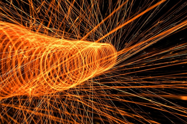 Ring made of sparklers on a black background