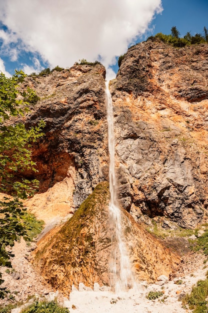 Rinka waterfall located in Logarska dolina national park in Slovenia Second highest waterfall in Slovenia Popular hiking destination in the Alps