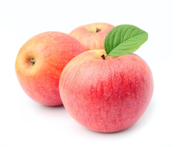 Ripe apples fruit with leaves close up