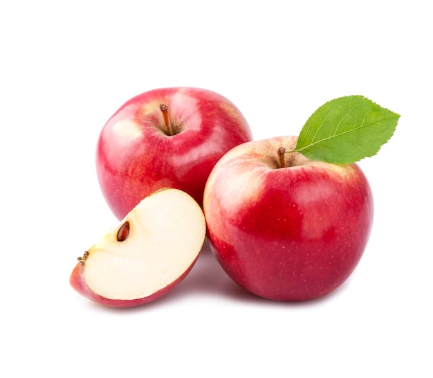 Ripe apples with leaves closeup