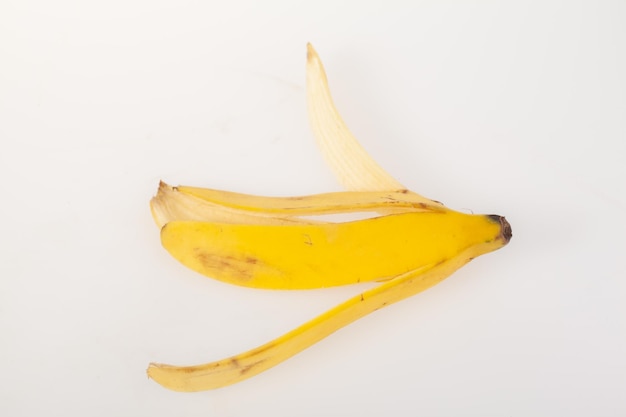 Ripe banana peel isolated on white background