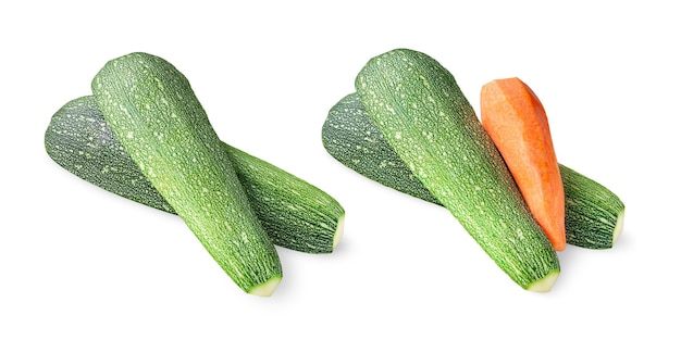 Ripe carrots and zucchini Zucchini slices and peeled carrots set Veggies isolated on white