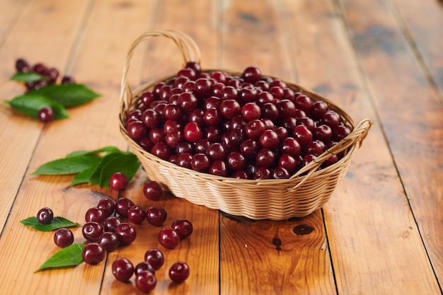 Ripe cherries in a wicker basket