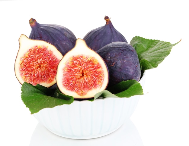 Ripe figs in bowl isolated on white