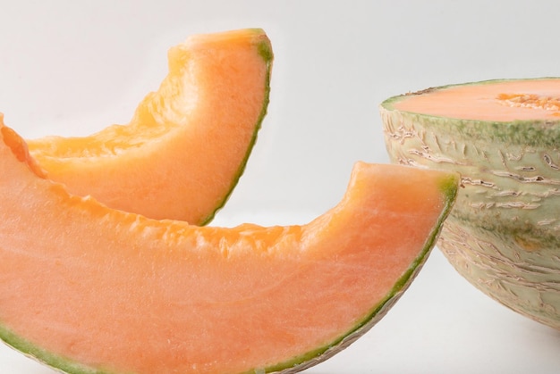 Ripe and fresh melon isolated on white background