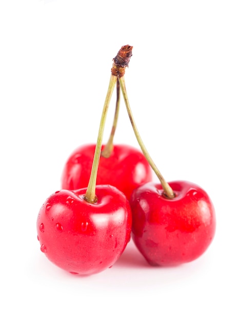 Ripe fresh red cherry isolated on white surface