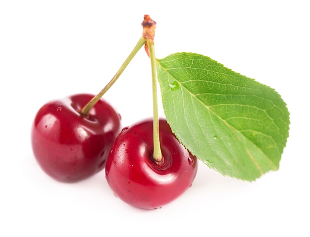 Ripe fresh red cherry isolated on white surface