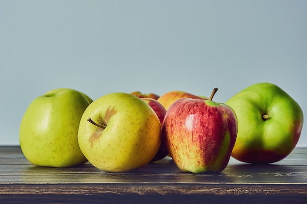 Ripe fruits, apples on a wooden old table. Fruit still life