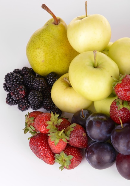 Ripe fruits and berries isolated on white