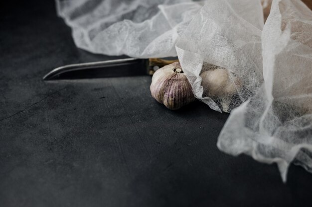 Ripe garlic and a knife