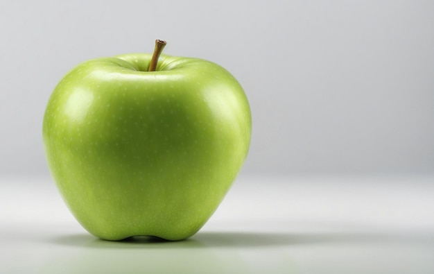 Ripe green apple on grey background