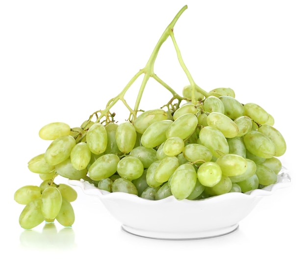 Ripe green grapes on plate isolated on white