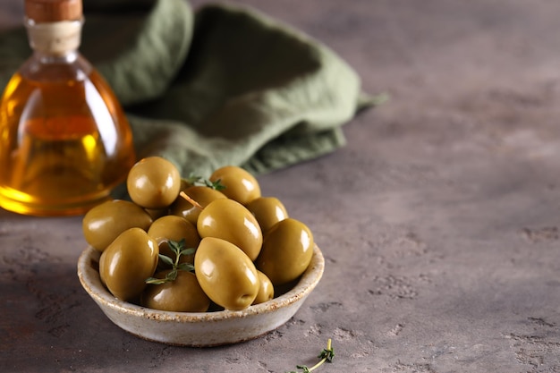 ripe green olives healthy food on the table