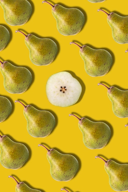 Ripe green pear pattern Many pears on a green background View from above