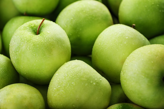 Ripe and juicy Green apples with dew drops. Juicy fruit In full screen