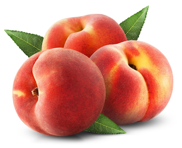 Ripe juicy peaches with leaves on white