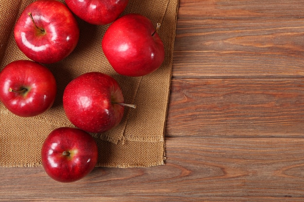 Ripe juicy red apples on the table