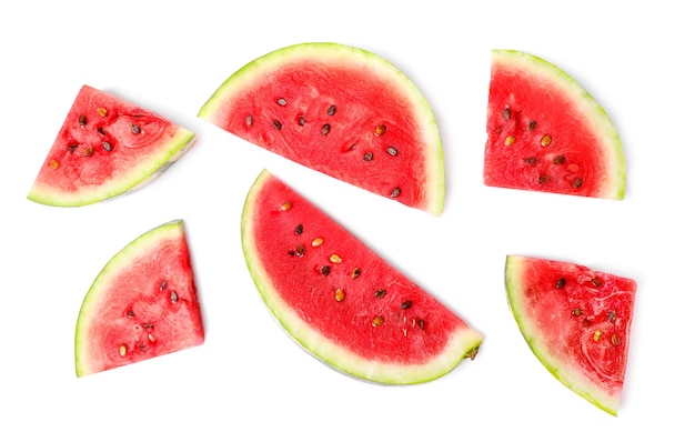 Ripe juicy watermelon pieces flat lay isolated on white background. Top view.