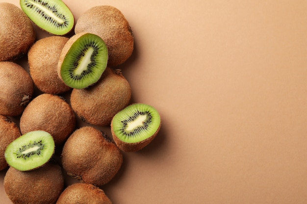 Ripe kiwi on craft brown surface